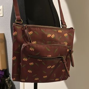 Floral cross body purse.